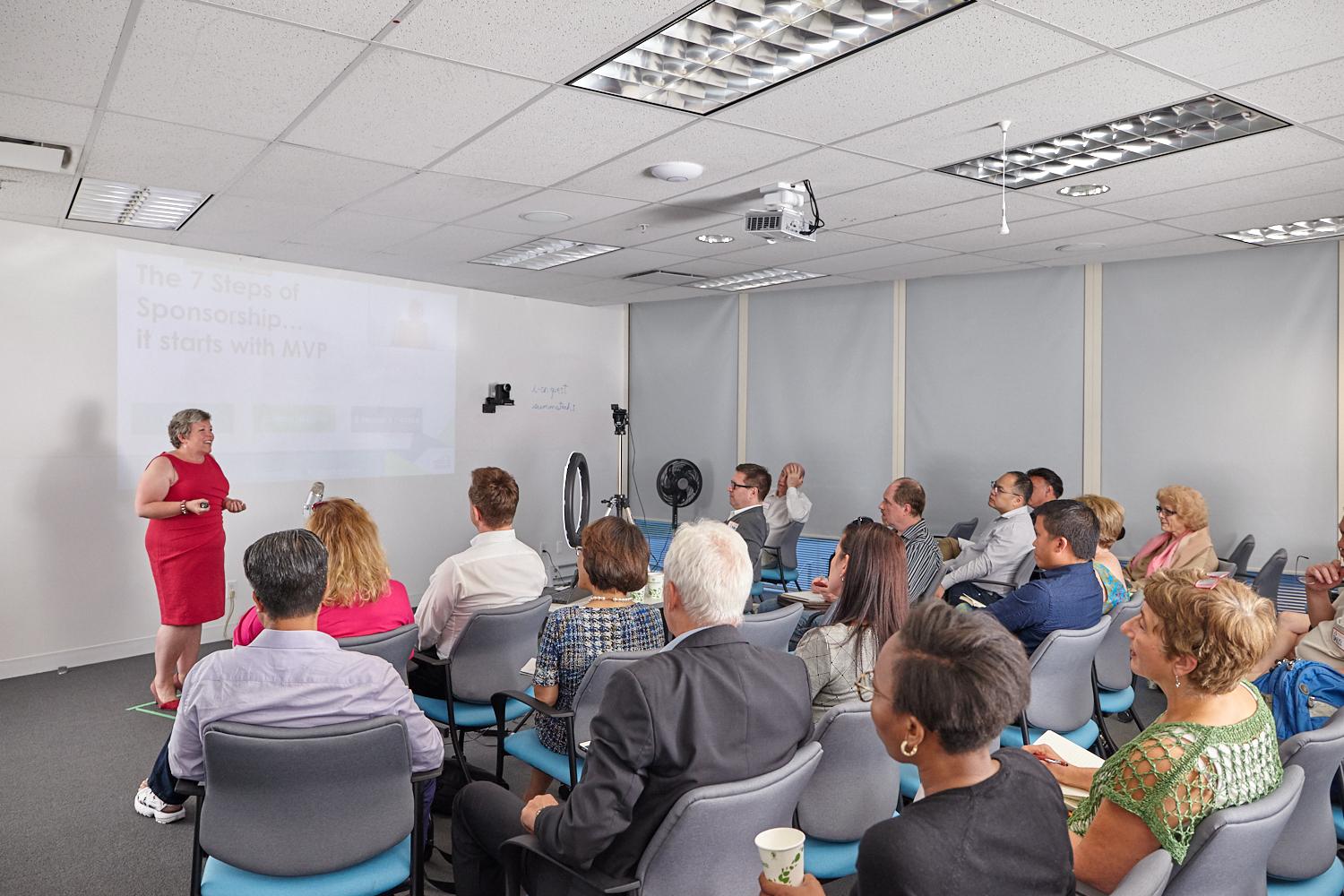 Charmaine speaking at event